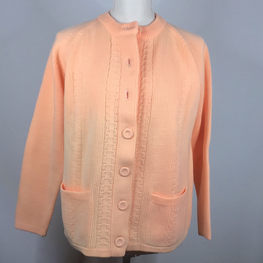 Cardigan Sweater with covered knit buttons.